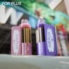 Pink and purple models of FOR PLUS 50000 Puffs 50k vape devices displayed together.