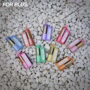 Multiple flavors and color variants of ELE World FOR PLUS 50000 Puffs 50k disposable vapes arranged in a fan shape on white stones.