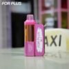 Pink and gold edition of FOR PLUS 50000 Puffs 50k disposable vape kit standing next to a taxi sign.